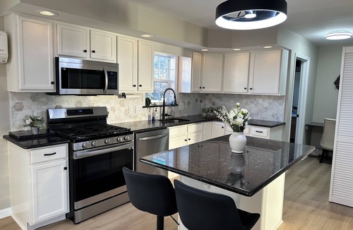 Beach Haven West House | Pet friendly 3-bedroom house with saltwater heated pool. EV charger.