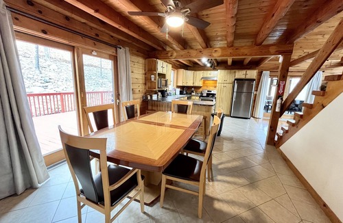 Bushkill Ski Chalet | Pocono Chalet Cabin Sauna Game Room Fire Pit Pools