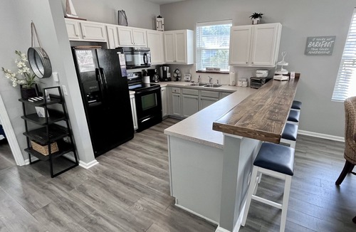 North Myrtle Beach Condo | Premier Golf Location - Barefoot Resort! Family/dog friendly - 2 pools/beach!
