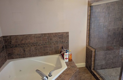 Millers House | Queen Suite w/Jetted Tub, Private Bath & Shared Theater and Gym