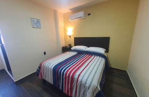 Ciudad Madero Hotel | Refugio Acolchado: Habitaciones Dobles para Humanos y Peludos Compañeros