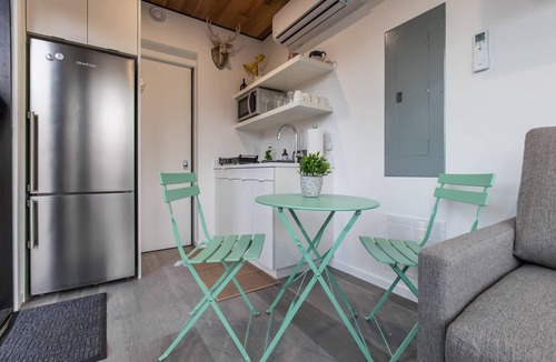 Rileyville Apartment | Riverside Tiny Cabin w Hot Tub, Fire Pit, & Kayaks