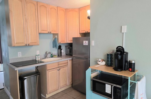 Silver Beach Park Condo | Roomy studio with Heated pool and gym on the beach!