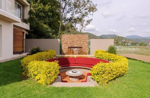 El Santuario House | Spectacular lakefront home with pool