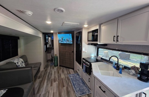 Bell House | Stay at The Rusty Hooker a Cozy Camper in Perry Fl