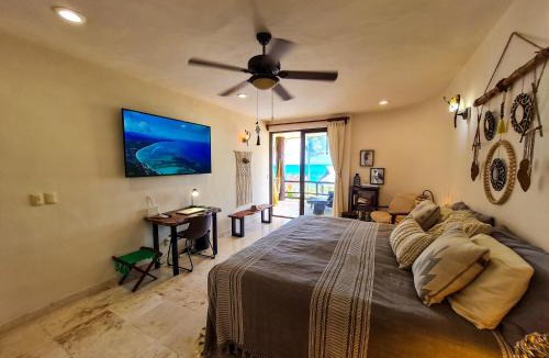 Majahual Apartment | STYLISH OCEANFRONT CONDO with POOL