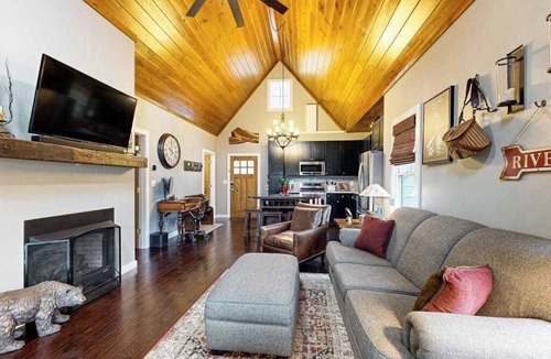 Cullowhee House | Take in the natural beauty from this elegant riverfront home