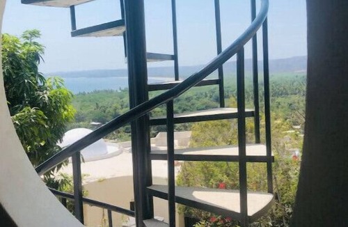 La Manzanilla Apartment | "The Dharma room" a bedroom with a fantastic view.n