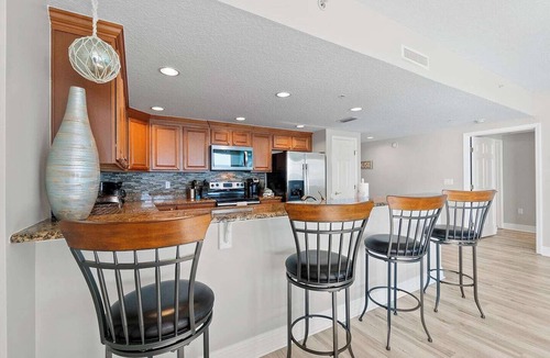 Daytona Beach Condo | This 8th-floor 3BR/3BA beachfront condo in Daytona Beach Shores offers stunning ocean views. Steps from the Atlantic Ocean, enjoy the beach, pool, or jacuzzi, then watch sunsets over the Intracoastal and downtown from your private balcony.