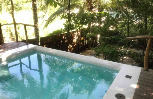 Arroyo Cruz House | Tree house Pergola Swimming pool at a virgin beach