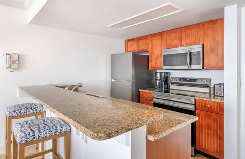 Elrod Estates Hotel | Two Coastal 2BR Units for Pool Relaxation, Ocean Walks & Family Fun