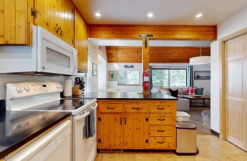 Truckee House | Updated home on quiet street with gas fireplace, shared hot tub, pool, & more