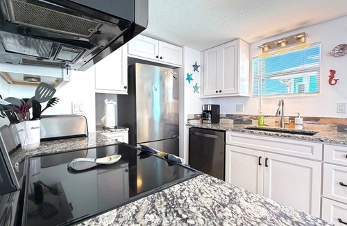 Nettles Island House | Waterfront Stunning 2 bed 2 bath riverfront beach home on Nettles Island