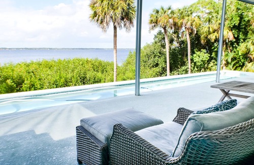 Merritt Island House | Waterfront Sunset View Home W/Pool. King bed