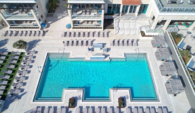 Bask in Modern Style Comfort! 2 City View Units, Beachfront Property w/Pool