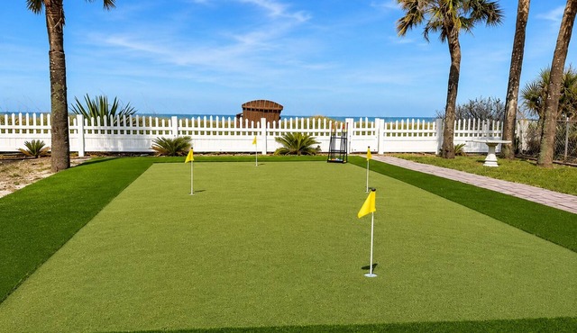 Beachfront Villa with Heated Pool Mini Golf Fire Pit and SpaceX Views