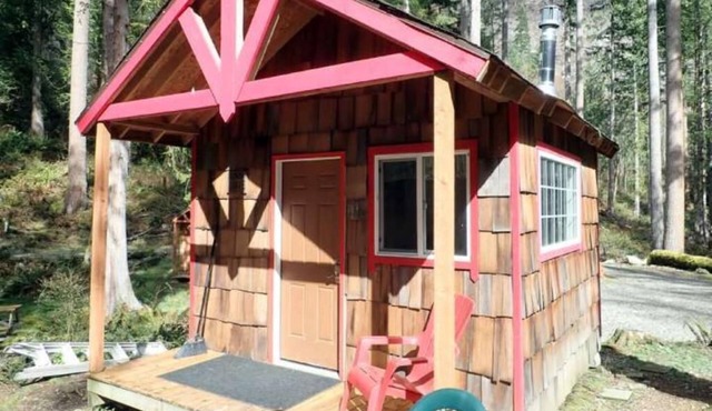 Cabin and adjacent tent site