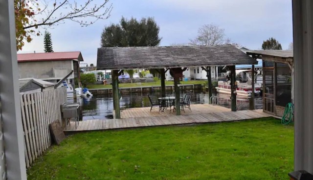 Canal access to the St. Johns River. Private boat dock. Parking for trailer