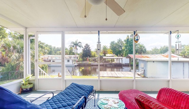 Canal-Front Home with Private Covered Boat Dock & Waterfront Screened Porch