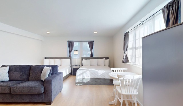 Comfortable Coastal Retreat with Two Queen Beds & Sleeper Sofa - Suite Room
