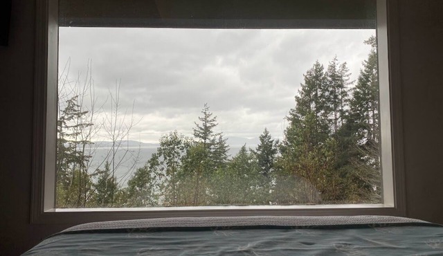 Cozy hidden gem tucked away where the mountains meet the sea.