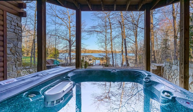 Inviting waterfront cabin with hot tub, kayaks, and beautiful sunsets