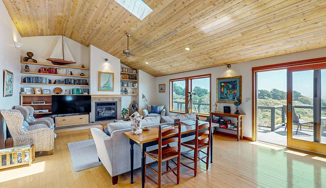 Rejuvenate in this home with fire place, hot tub, ocean/lighthouse/sunset views