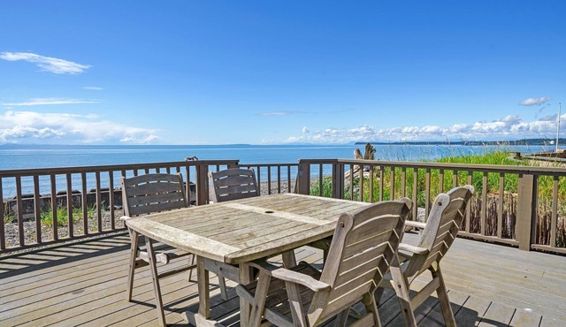 Sandy Point Sanctuary: 2BR Home w/Stunning Ocean Views, Cozy Fireplace & Deck