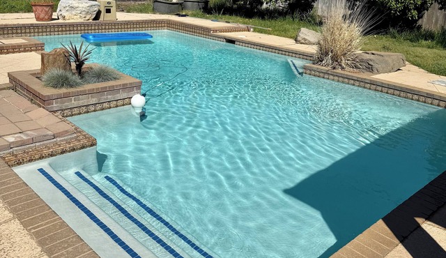 Spacious 4-bedroom family home with sparkling pool
