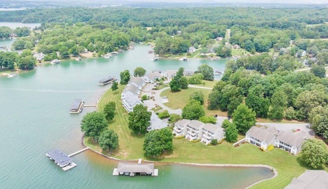 The full Smith Mountain Lakefront experience: private boat slip, 3 balconies, game room, community pool & beach, propane grill, and pets welcome. No resort fees, ever.