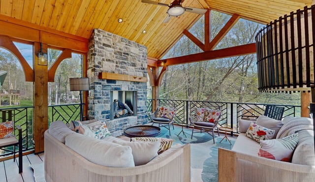 Tranquil lakefront retreat with hot tub, screened porch, kayaks, and more