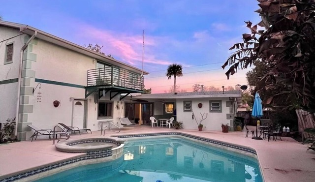 Tropical Riverside Oasis with Private Pool Near drive-on beach & river access