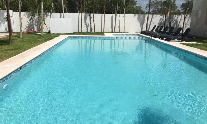 Puerto Juarez Apartment | Luxurious & Unique Selva Nova Beach Apartment