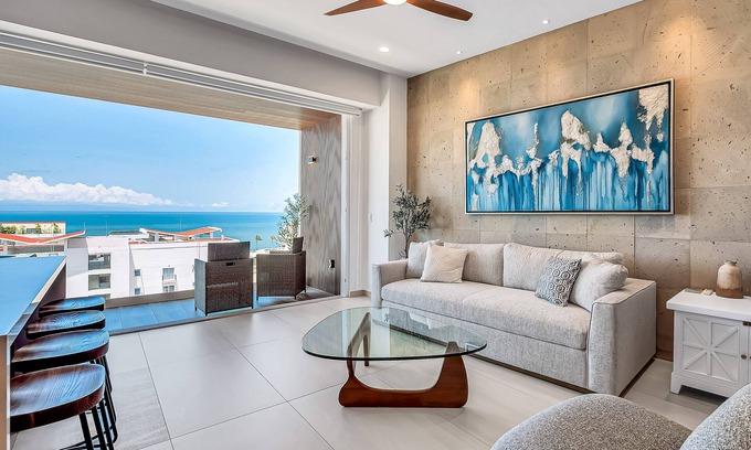 Bucerias Condo | Modern waterfront condo with shared pool, balcony, and washer/dryer