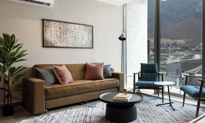 Monterrey Apartment | Stylish Apartment: Pool, Gym & Mountain Scenery