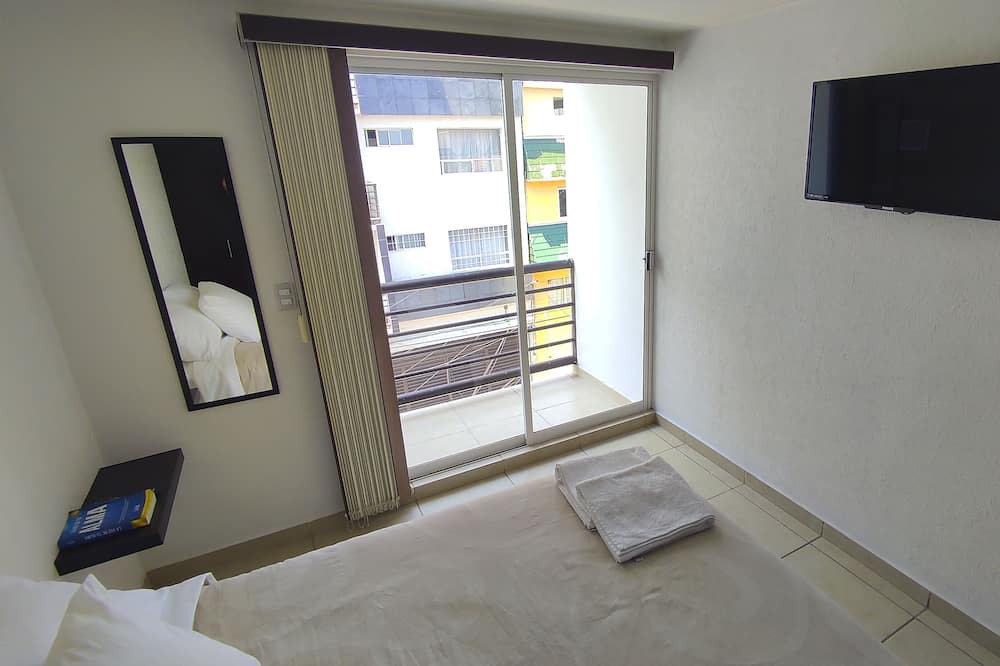 Photo of Bedroom in Agricola Oriental