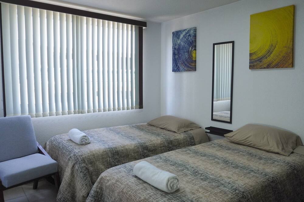 Photo of Bedroom in Agricola Oriental