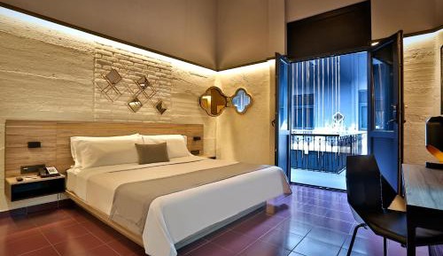 Queen Suite with Two Queen Beds and Sofa Bed