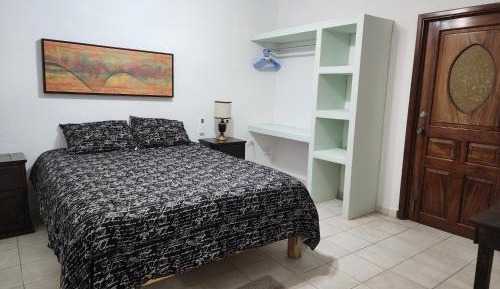 Queen Room with Shared Bathroom